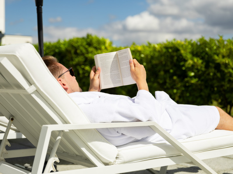 Reader on a sunlounger
