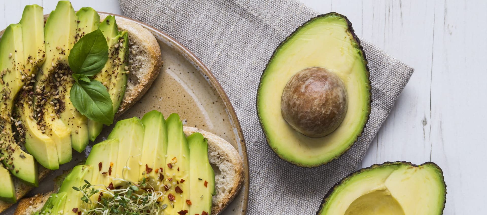 A plate of avocados on toast, one of the healthiest foods for your gut and overall being.