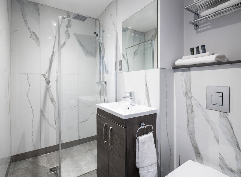 Walk in shower in bathroom